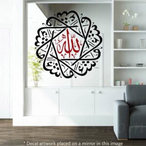 A black & red “Masha'Allah” decal placed on a mirror. 